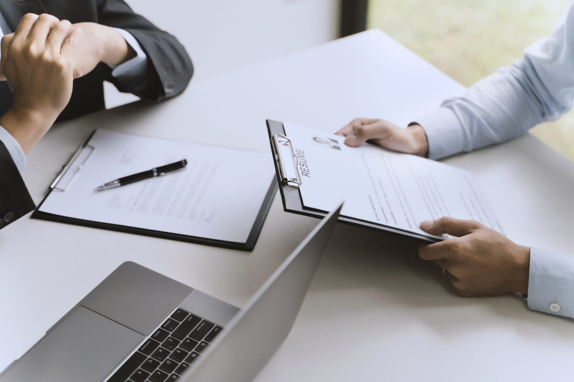 An HR manager in conversation with an employee