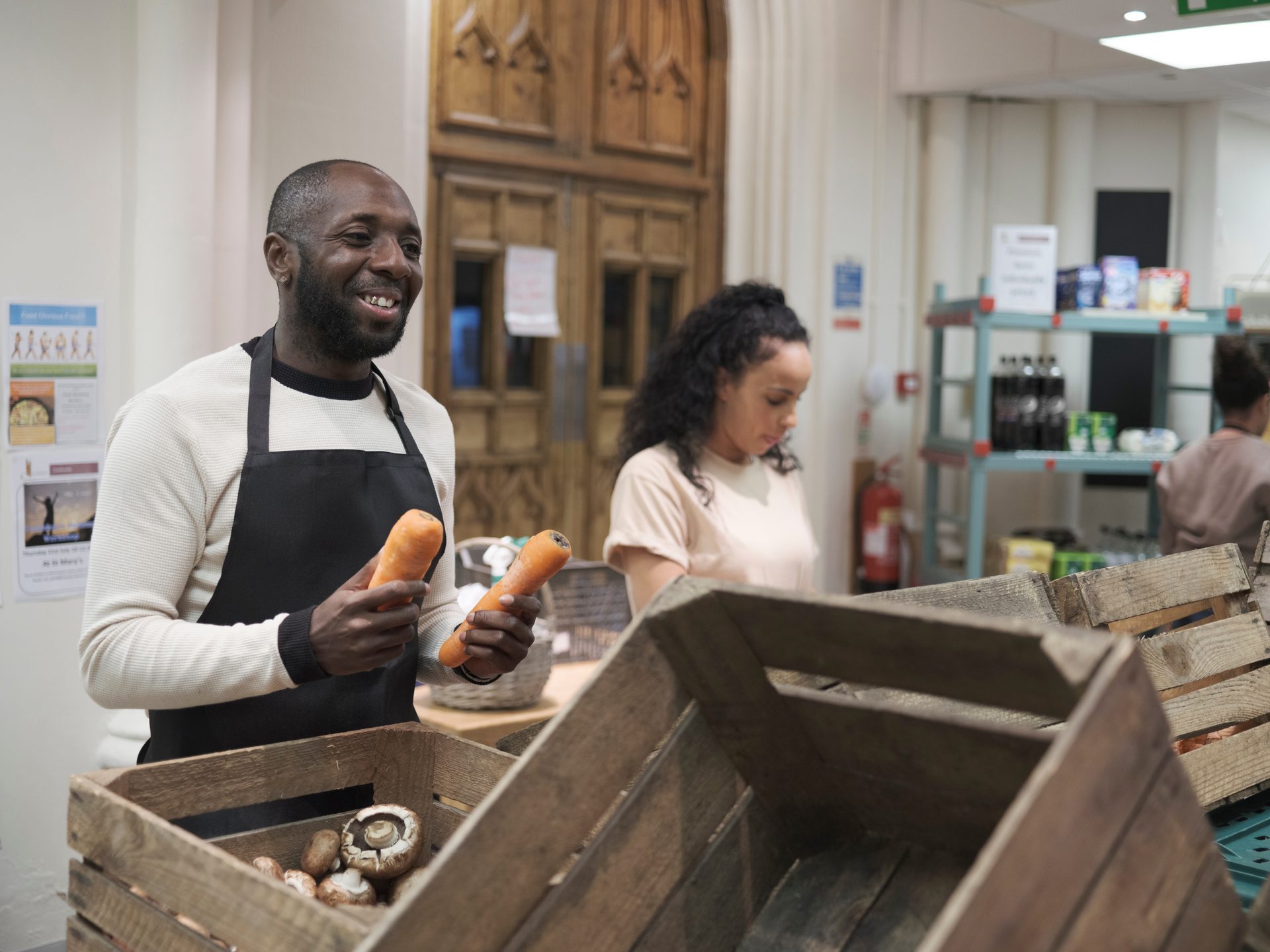 Volunteers sorting food parcels at a community food centre